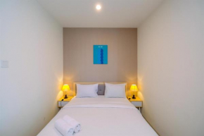 Cozy and Great Choice Studio at Grand Kamala Lagoon Apartment By Travelio